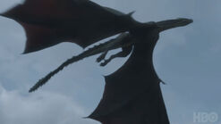 Drogon flying over Dragonstone.