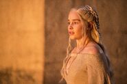Daenerys's new gowns have a deep V-cut neck but are tightly fastened at the top - they hint at being revealing without actually revealing much, in order to exude an image of restraint and control.