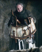 Hodor holds Bran's new saddle in "A Golden Crown".