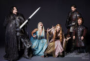 Game of Thrones cast in light moment, with Kit Harington doing air guitar.