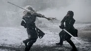 A White Walker wields an ice-blade spear weapon against Jon Snow - not realizing that Jon is wielding a Valyrian steel sword