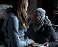 Sansa practicing her needlework with Septa Mordane in "Winter Is Coming."