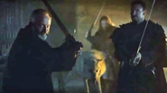 Davos and the loyal Night's Watch men prepare to defend Jon's body against Alliser Thorne and the Mutineers.