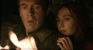 Stannis and Melisandre see his future in the flames in "Valar Morghulis."