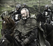 Davos accompanies Stannis to a parley in "Garden of Bones".