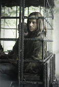 Jaqen as a captive recruit of the Night's Watch in "The Night Lands."