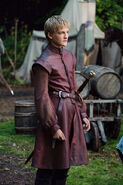 Even as the Crown Prince when he first appears in Season 1, Joffrey wears well-made clothing and jeweled rings on his fingers.