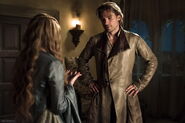 Based on the asymmetrical cut of Cersei's kimono-style dresses, Lannister men have an asymmetrical cut to their tunics as well.