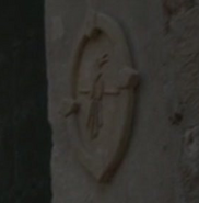 The mockingbird sigil outside the brothel owned by Petyr Baelish in "Two Swords".