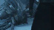 Dead Viserion being pulled out of the lake.