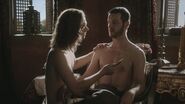 Renly is shaved by his lover Loras Tyrell in "The Wolf and the Lion".