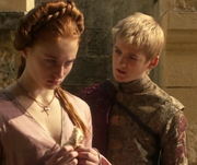 Joffrey torments Sansa on the traitors walk in "Fire and Blood."