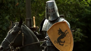 Ser Gregor Clegane, with a single black dog on his shield (instead of the full three)