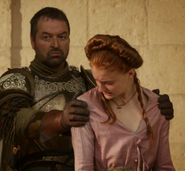 Sansa and Meryn 1x10.png (252 KB) Ser Meryn Trant restrains Sansa in "Fire and Blood."