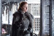 By Season 7, Sansa is now in heavier pelts and donning her own simple Livery collar while in Winterfell- promoting herself as Lady of the House.
