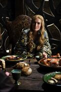 Cersei breakfasting in Winterfell in "The Kingsroad."