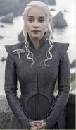 Daenerys in a more military inspired wardrobe by Season 7. Note the triple-dragon pin, more a military decoration than a piece of jewelry.