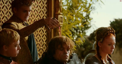 Joffrey pours wine on Tyrion's head in "The Lion and the Rose".