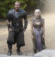 A promotional image of Daenerys Targaryen and Jorah Mormont in "Valar Morghulis."