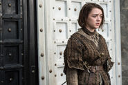 Arya at the door of House of Black and White.