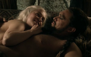 Daenerys reveals her pregnancy to Drogo.