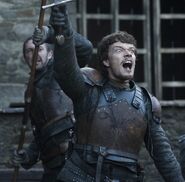 A promotional image of Theon Greyjoy and Dagmer in "Valar Morghulis."