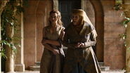 Olenna also shifts to wearing bolder, intimidating colors in Season 5. She changes from a soft teal shawl to a more imposing gold one, which brings out the darker greens and golds of her gown.