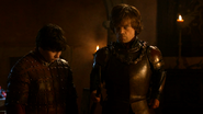 Podrick Payne helps Tyrion put on his custom-fit armor