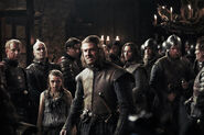 Jory accompanies Eddard and Arya Stark as Arya gives evidence to the King about the attack on his son by her direwolf.