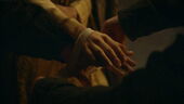 The septon "ties the knot" around Edmure and Roslin's hands while reciting the prayers.