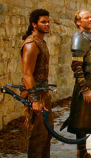 , a Dothraki warrior, holding an arakh.