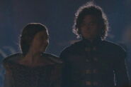 Margaery walks with her brother Loras in Renly's