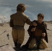 Yezzan zo Qaggaz kneels to Tyrion