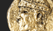A gold dragon depicting King Viserys I[14]