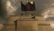 The Targaryen banner triumphantly crowns the Great Pyramid of Meereen.