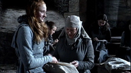 Sansa is first introduced at Winterfell in Septa Mordane's sewing circle: Sansa is skilled at sewing and can thus make alterations to her own clothing as she is influenced by new styles she encounters.