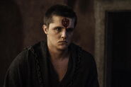 Lancel's forehead is engraved with the mark of the Faith Militant.