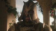 Ser Meryn Trant wearing the unique helmet of the Kingsguard.