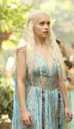Daenerys wearing a Qartheen-style dress she was lent when she first arrives in the city; she later grew to dislike the style and began making various alterations to copy elements from Qartheen male designs