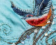Detail of the embroidery Cersei's early Season 1 dresses; note that they are innocuous birds - like her "little dove" Sansa.