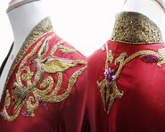 Closeup of the embroidery on Cersei's late Season 1 dresses - the color has changed to red, but she keeps the bird designs for a while.
