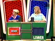 To accommodate multiple-digit numbers instead of just single/double-digit numbers for the Educated Guess questions, numbers were added to the podiums via computer graphics. As you can guess from the players here, this is from a Young People's Week.