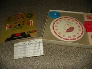 The components of the game, similar in all three editions (in fact, the words were the same in all three editions); a large "decoder wheel", "game wheel" cards and a score pad. Each game wheel contained six full games (three per side) of five words each. Only five such game wheels were included in each set, for a maximum of 150 passwords and 30 total games.