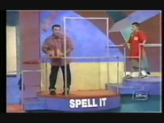 David demonstating the Spell It station to a contestant