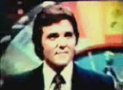 This is a very rare photo of Chuck Woolery from the Shoppers Bazaar pilot. Notice the vertical wheel.