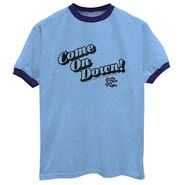 Blue shirt with black edging on the end of the sleeves and neck with the words "Come on Down" and the show's logo is small.