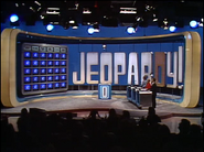 During the first season with this set's run, the neon Jeopardy! logo is in white, but it is recolored gold in Season 3...