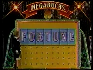 the updated FORTUNE wall w/ Michigan Lottery Hostess Aggie Usedly as the new Vanna White of Detroit.