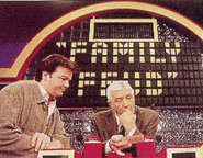 Richard and his son Gary Dawson reviewing a question on the 1994-1995 "Feud" set.