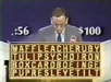A contestant playing the Solo Game from 1989, now using the same 4-by-14-letter board as the front game.